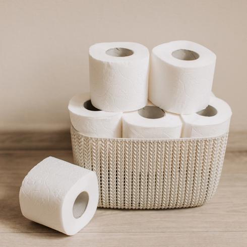 A basket with toilet paper - Habits-of-People-With-Super-Clean-Houses