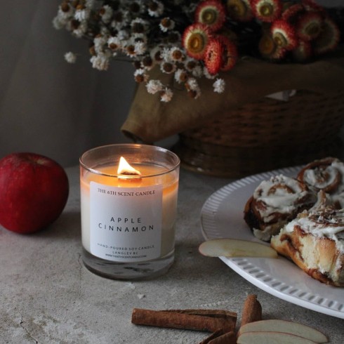 An apple cinnamon scented candle