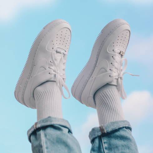 White sneakers in the air