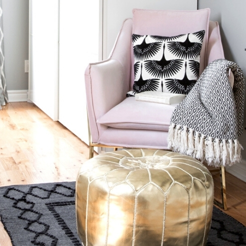 Pink arm chair and gold ottoman