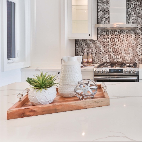 A marble countertop with decorative items on top