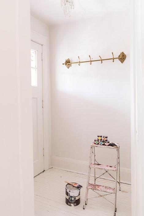 Clear entryway with white painted walls 