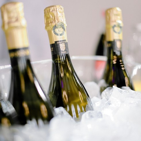 Bottles of champagne in an ice container