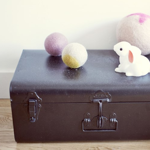A vintage trunk with toys on top