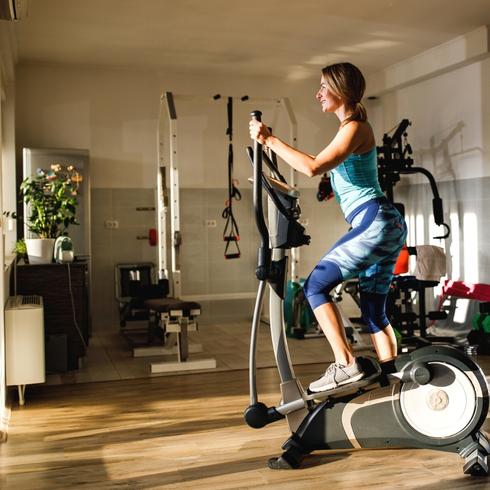 Woman working out in a home gym