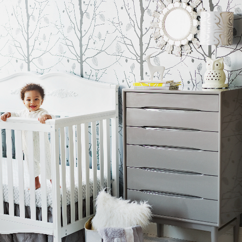 Baby Standing in Crib - stock photo