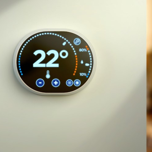 Picture of thermostat on a wall