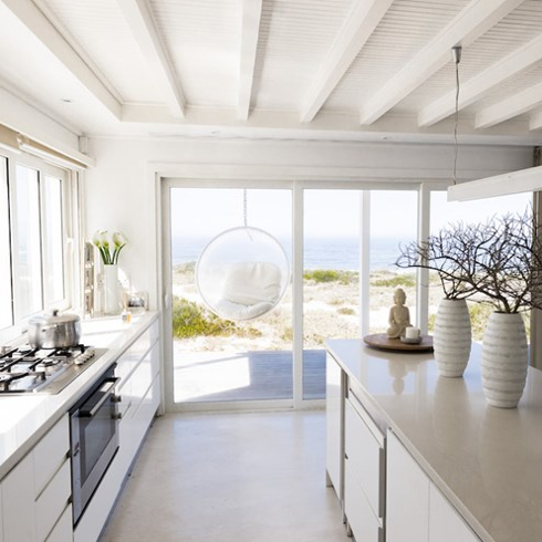 minimalist white and beige kitchen