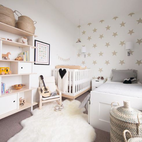 Soft nursery and toddler room with stars on the wall