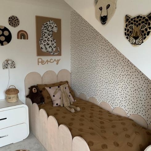 Kid's bed in nook with safari theme