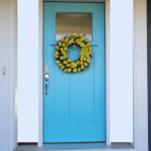 Blue door with tulip wreath