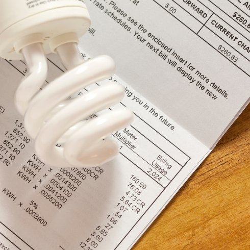 light blub on top of an electricity bill