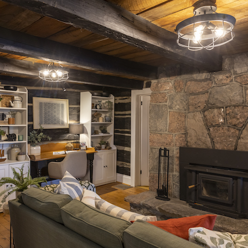 Cozy renovated cottage with a stone fireplace