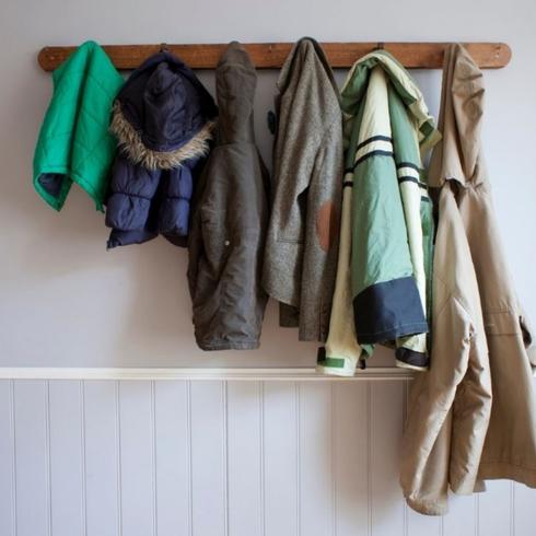 A wall mounted coat rack