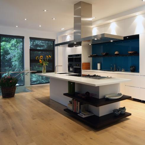 Kitchen island in a modern kitchen with white cabinets