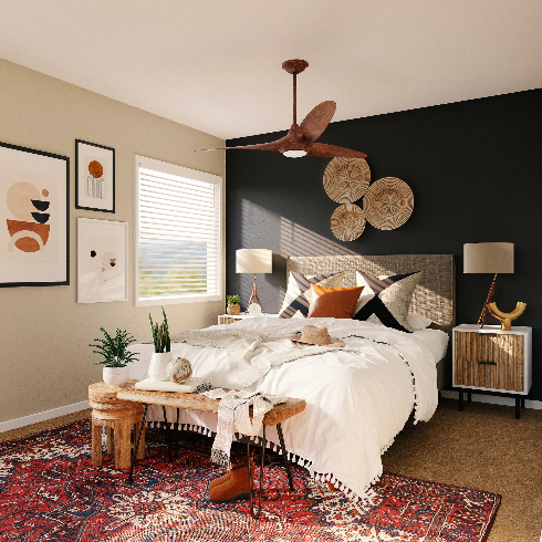 A cozy bedroom with a wooden ceiling fan