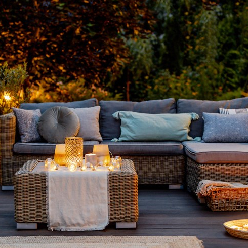 outdoor sectional with many throw pillows