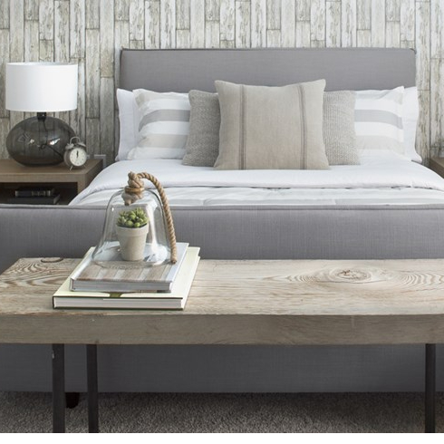 Elegant neutral bed and wood bench