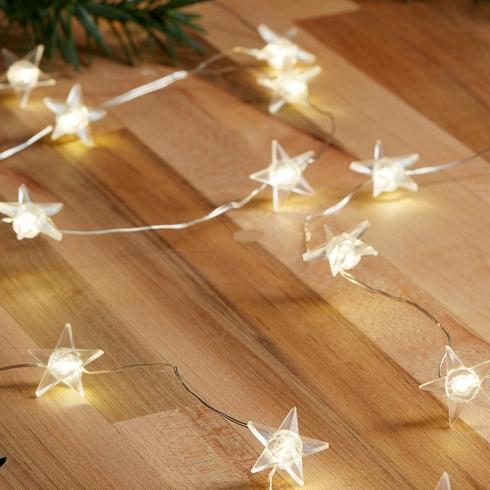 Sting of white Christmas lights in the shape of stars