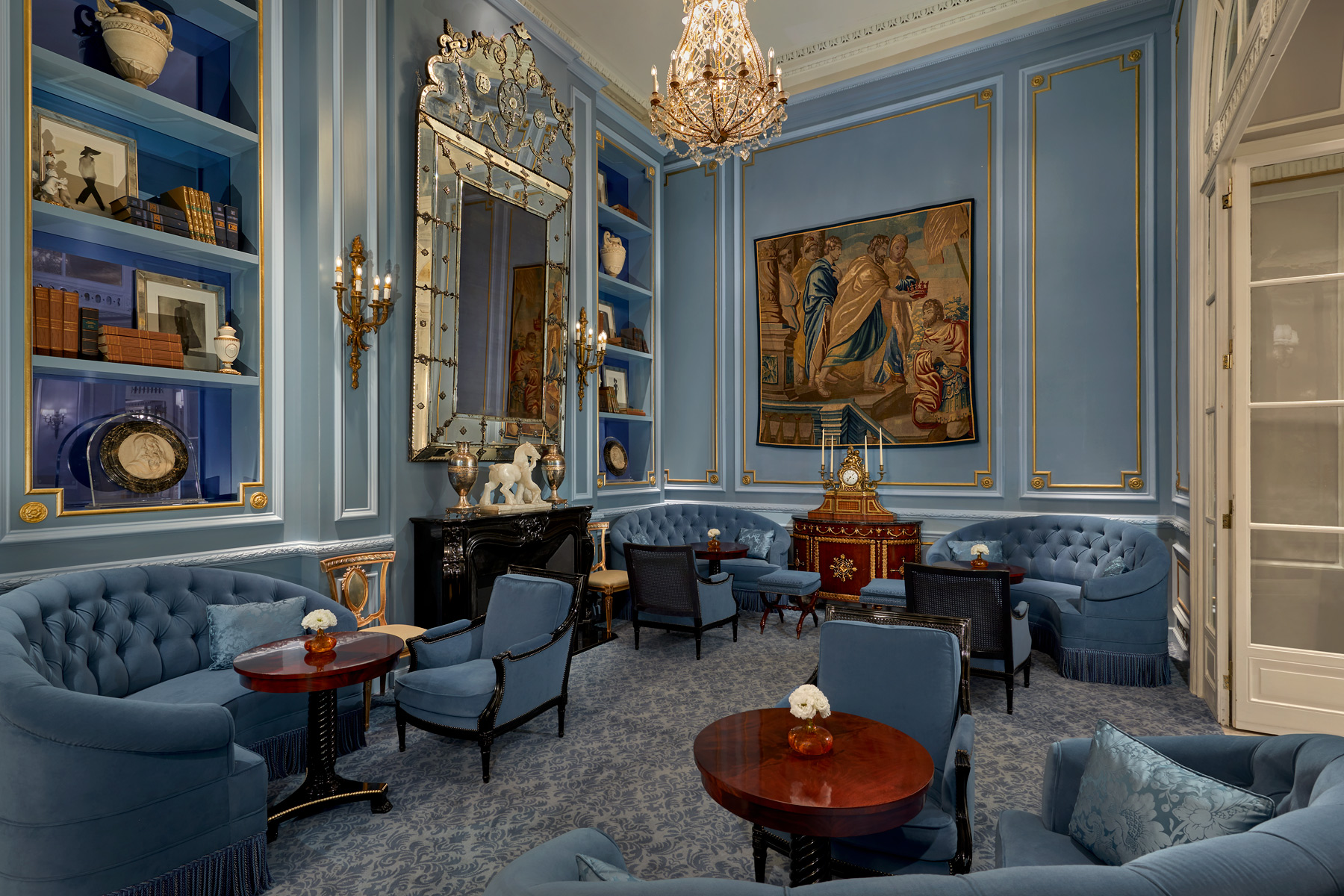 The new St. Regis Rome's gorgeous powder-blue hotel library.