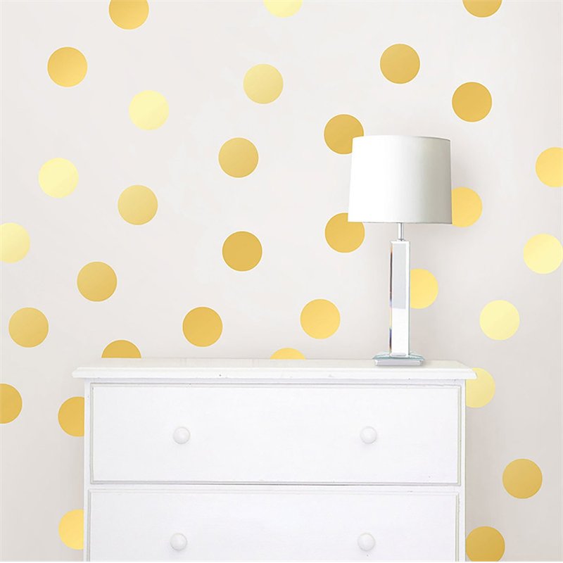 gold dot decals on white wall