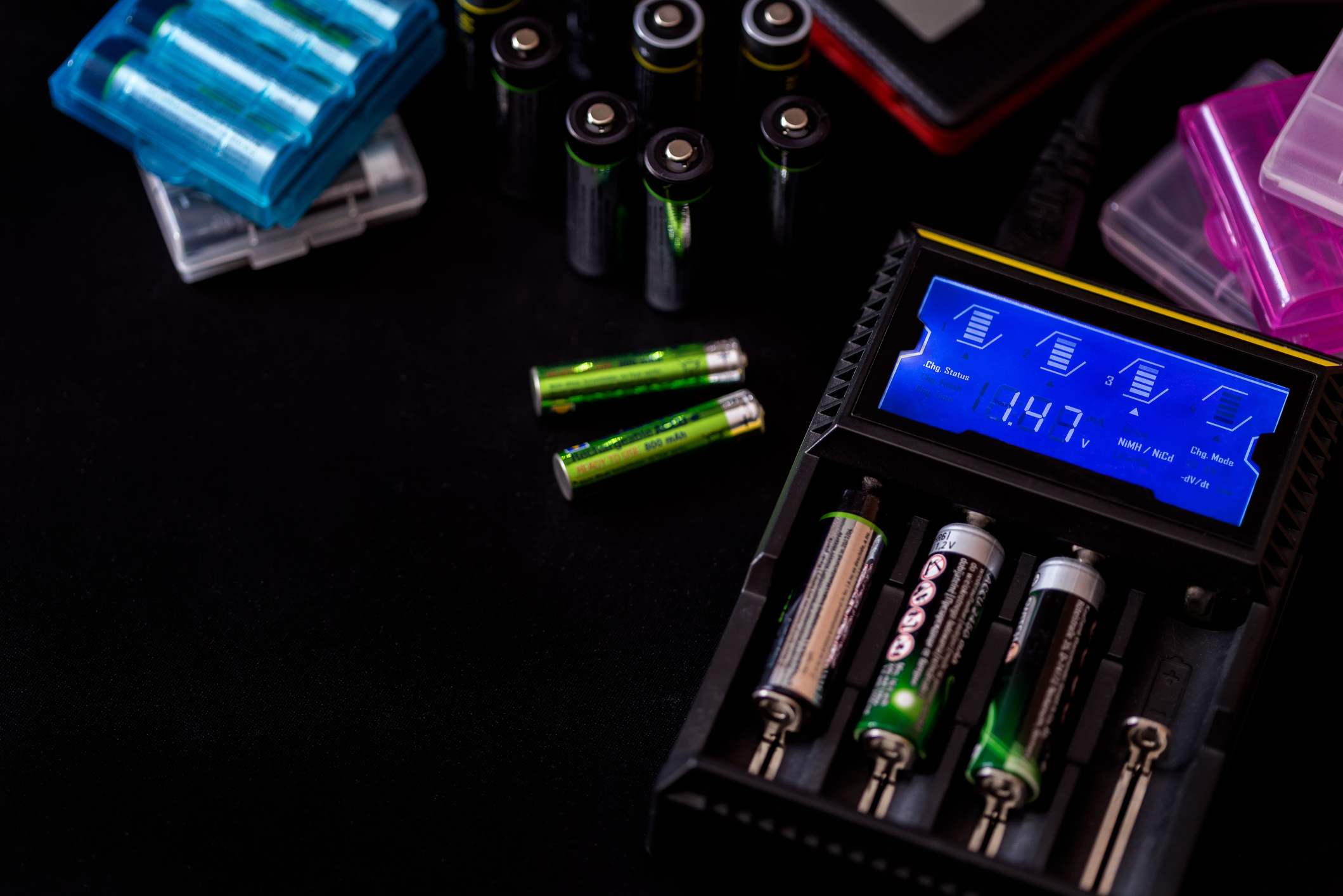 Electronic chargers with display for rechargeable batteries with many batteries