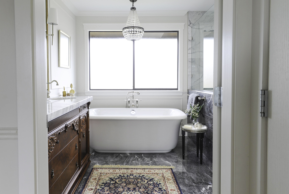 This Persian-style rug speaks to the bathroom's vintage vibe.