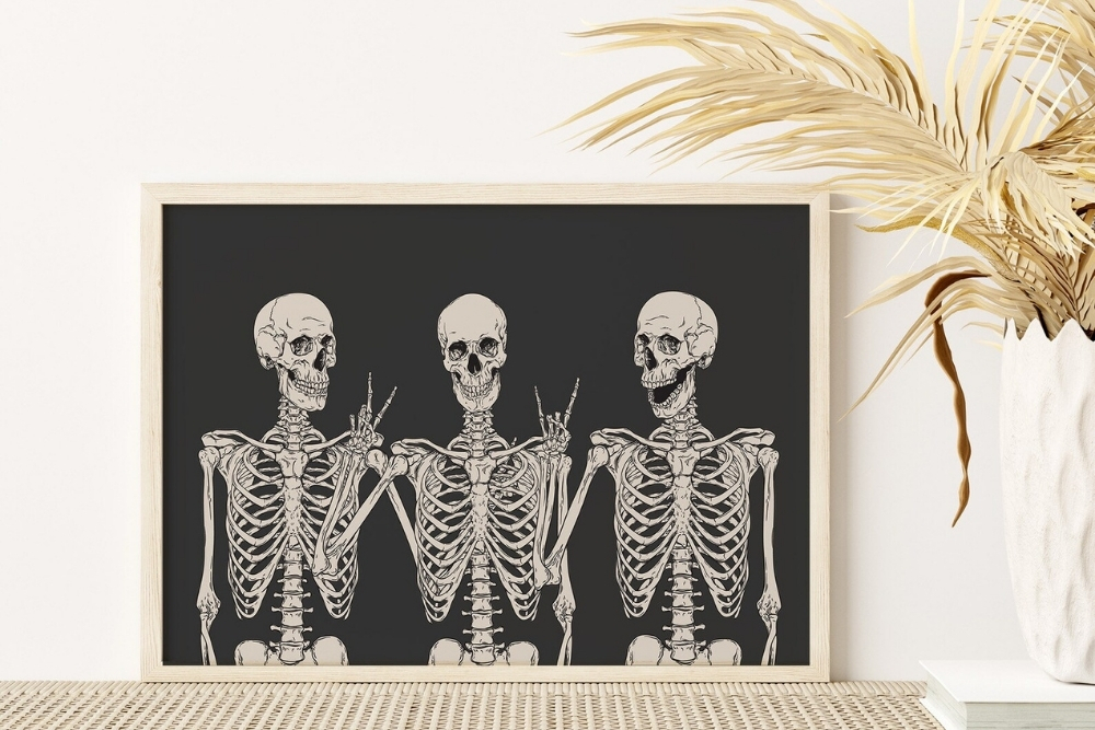 Three skeletons holding peace signs in a framed print