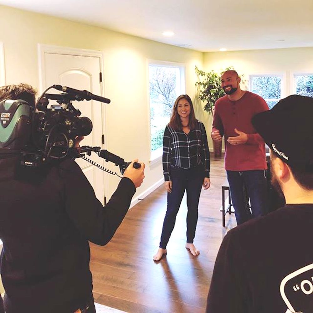 Rustic Rehab hosts Chenoa and David talking to camera during a day of filming