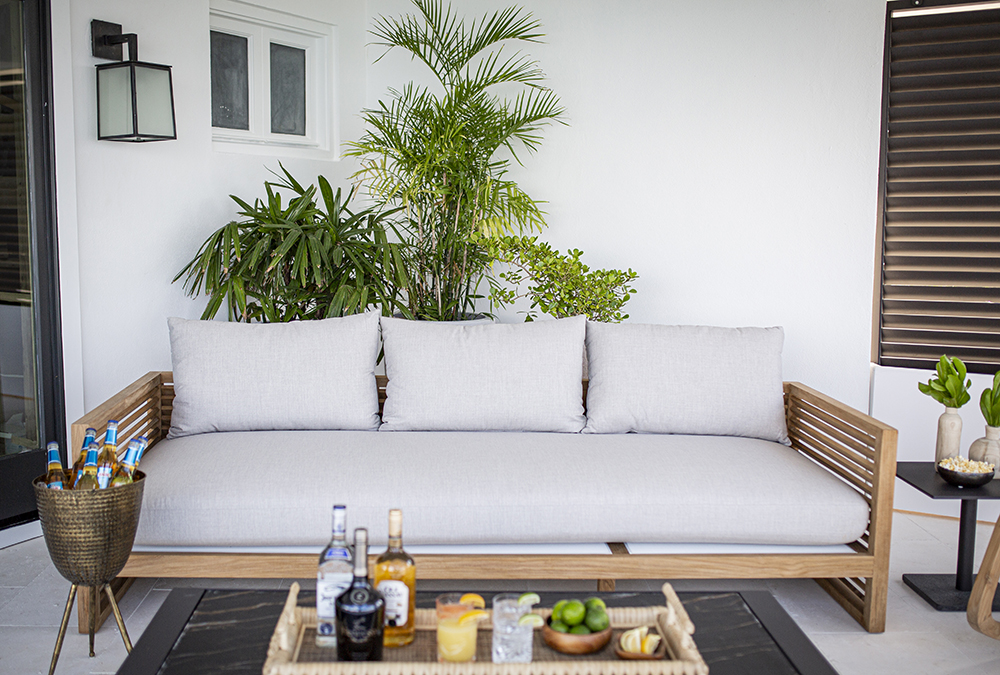 An outdoor couch on a guest suite deck