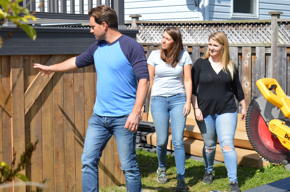 Buyers Bootcamp backwards bungalow Scott MacGillivray and sisters Jessica and Katelyn inspect the new back deck