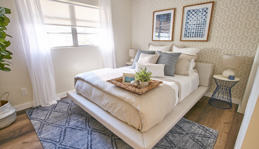 Taupe and blue work well together in this updated spare bedroom on buyers bootcamp