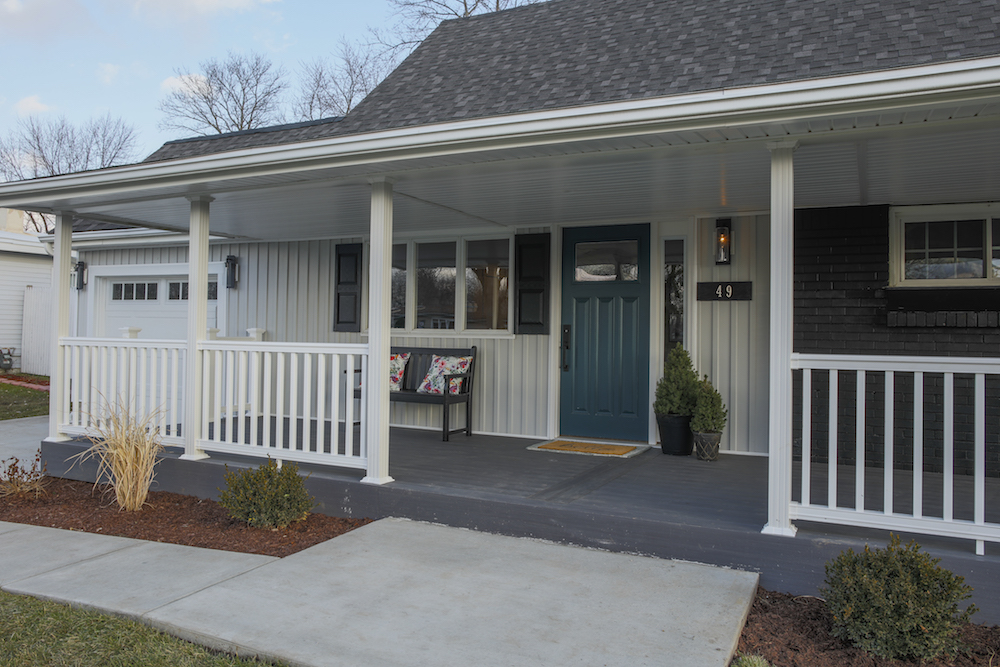Buyers Bootcamp Cape Cod house exterior with teal door and grey covered porch