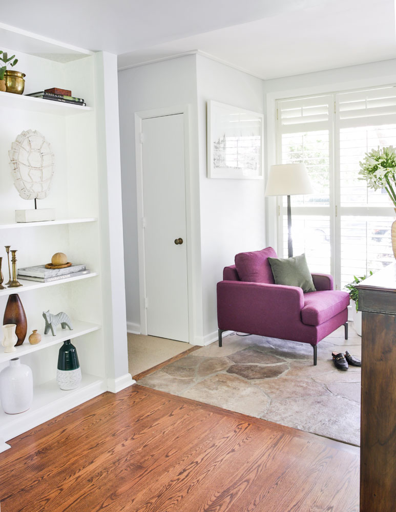 Purple armchair by front door