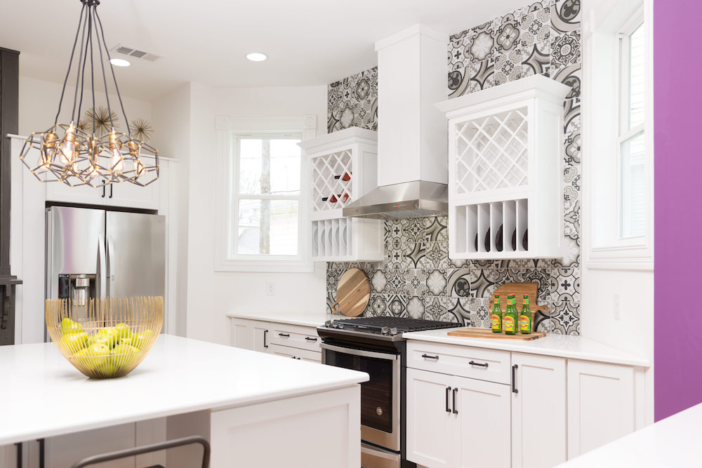 Masters of Flip bohemian Victorian house kitchen white countertop island and grey and white patterned backsplash tiles