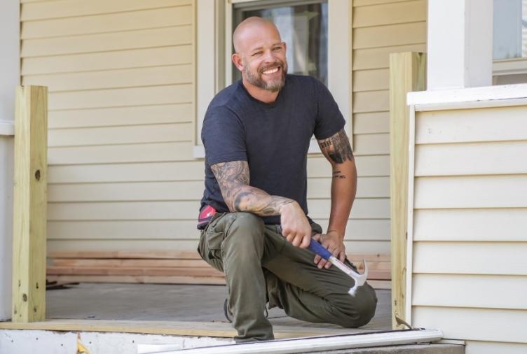 Joe the Home Inspector smiling on a porch