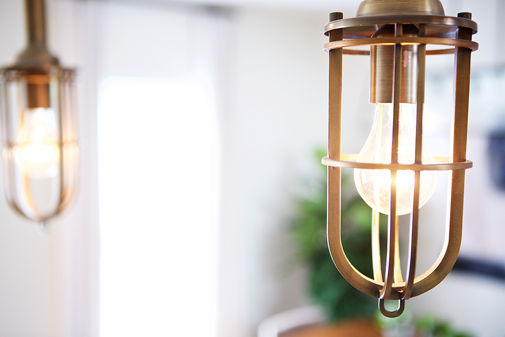 Golden caged pendant lamps