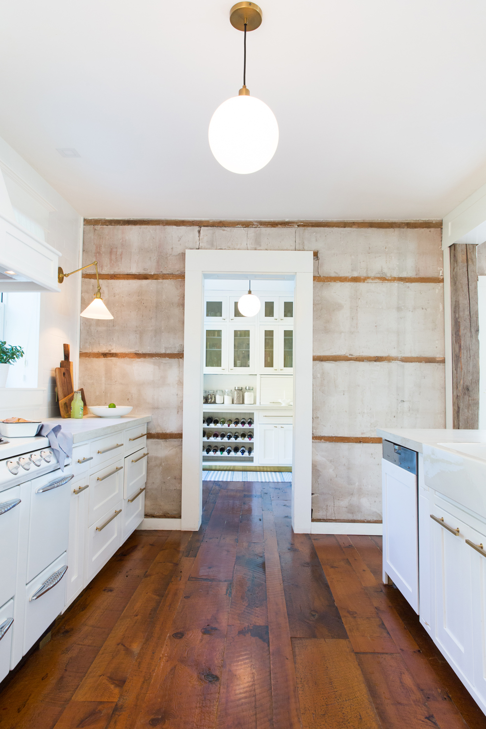 Original concrete and wood wall in kitchen