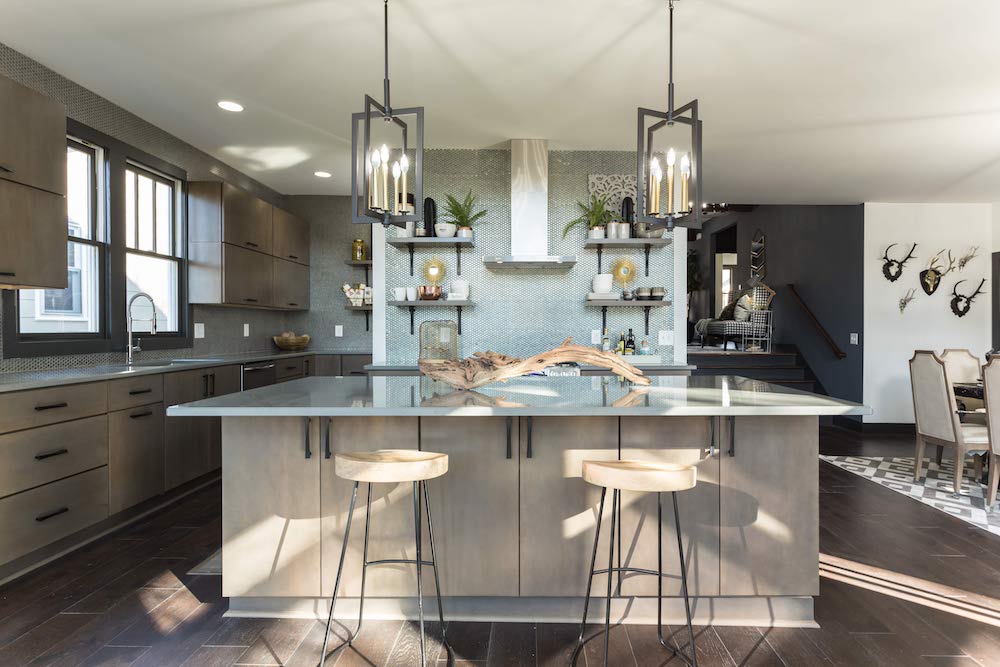 Masters of Flip luxe lodge kitchen island with two stool and modern over-counter light fixtures