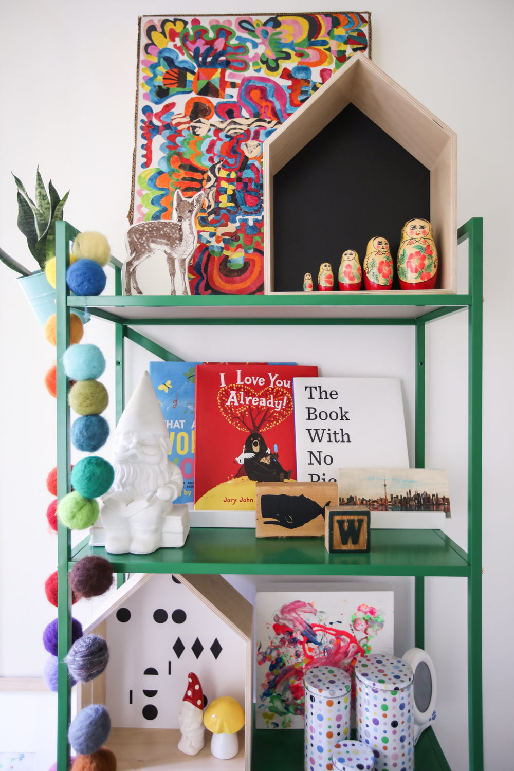 Bookshelf with curated children's toys