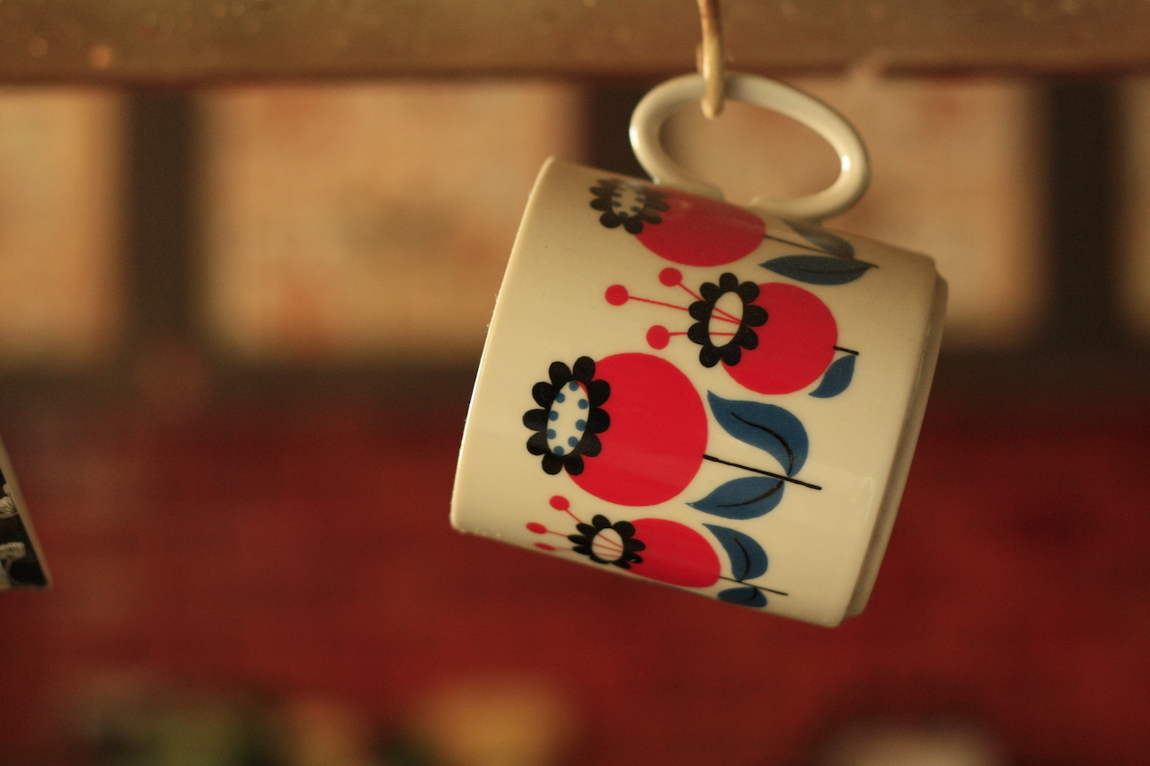 Coffee mug hanging from hook