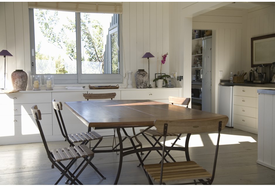 Outdoor patio furniture in the kitchen of a contemporary cottage