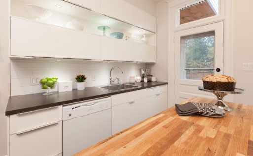 Modern apartment kitchen with butcher block island
