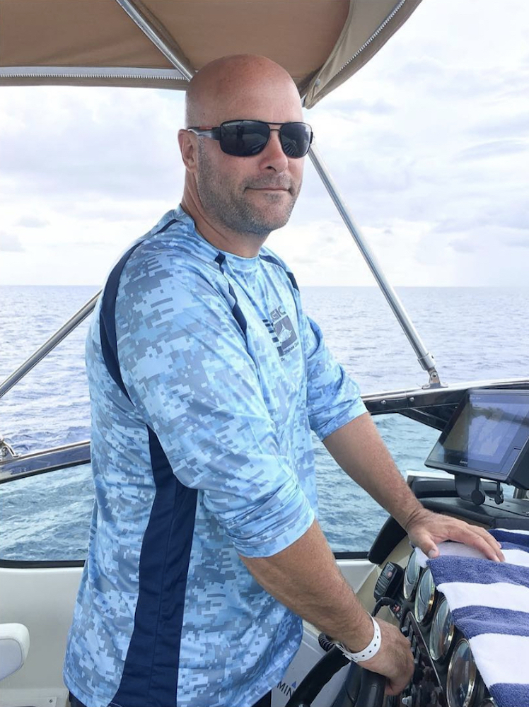 Bryan Baeumler at the helm of his family's yacht