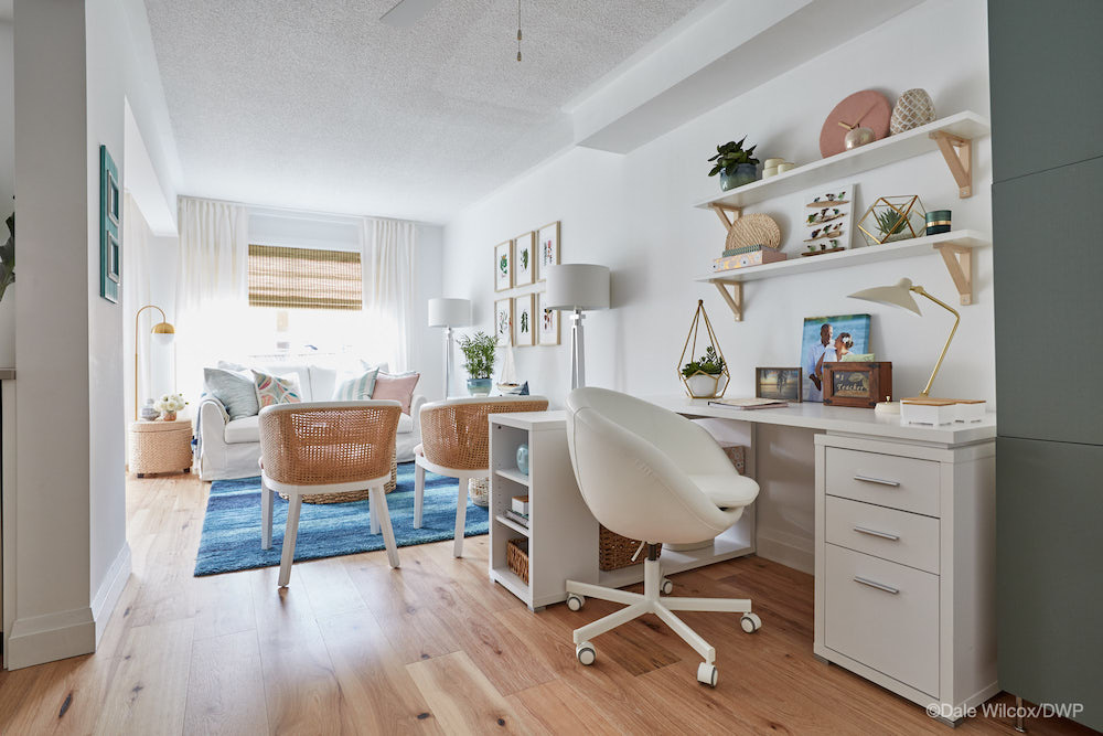 open concept living space with white desk and home office furniture at back