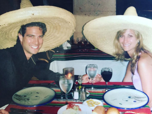 Scott and Sabrina McGillivray wearing sombreros in Mexican restaurant