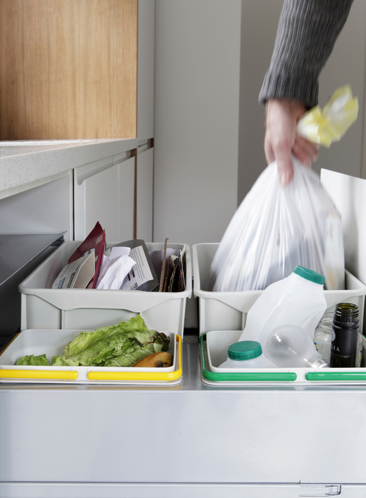 Garbage and recycling pull-outs in a kitchen