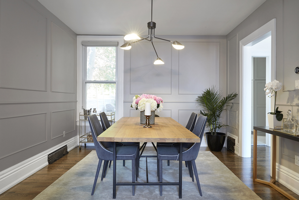 Buyers Bootcamp Victorian character home dining room with wooden table and grey upholstered chairs