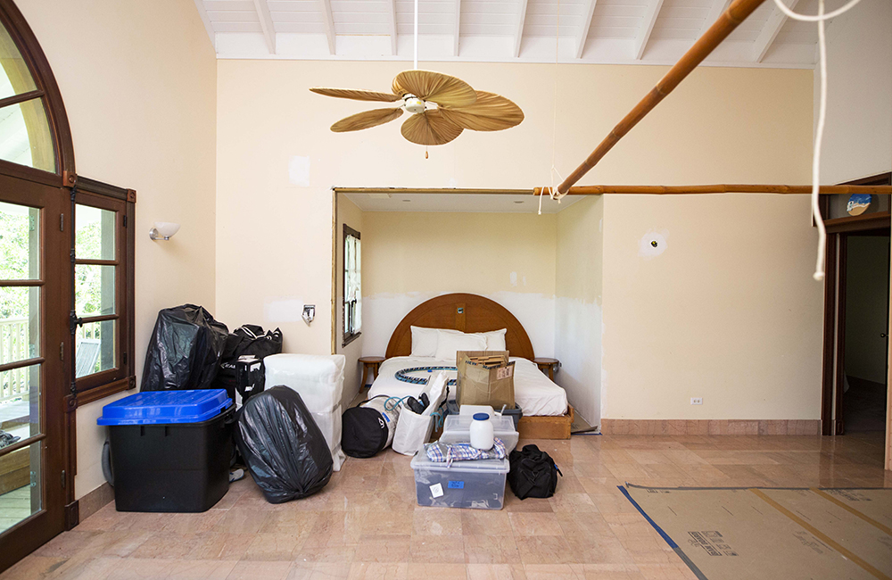 An empty villa with items in storage.