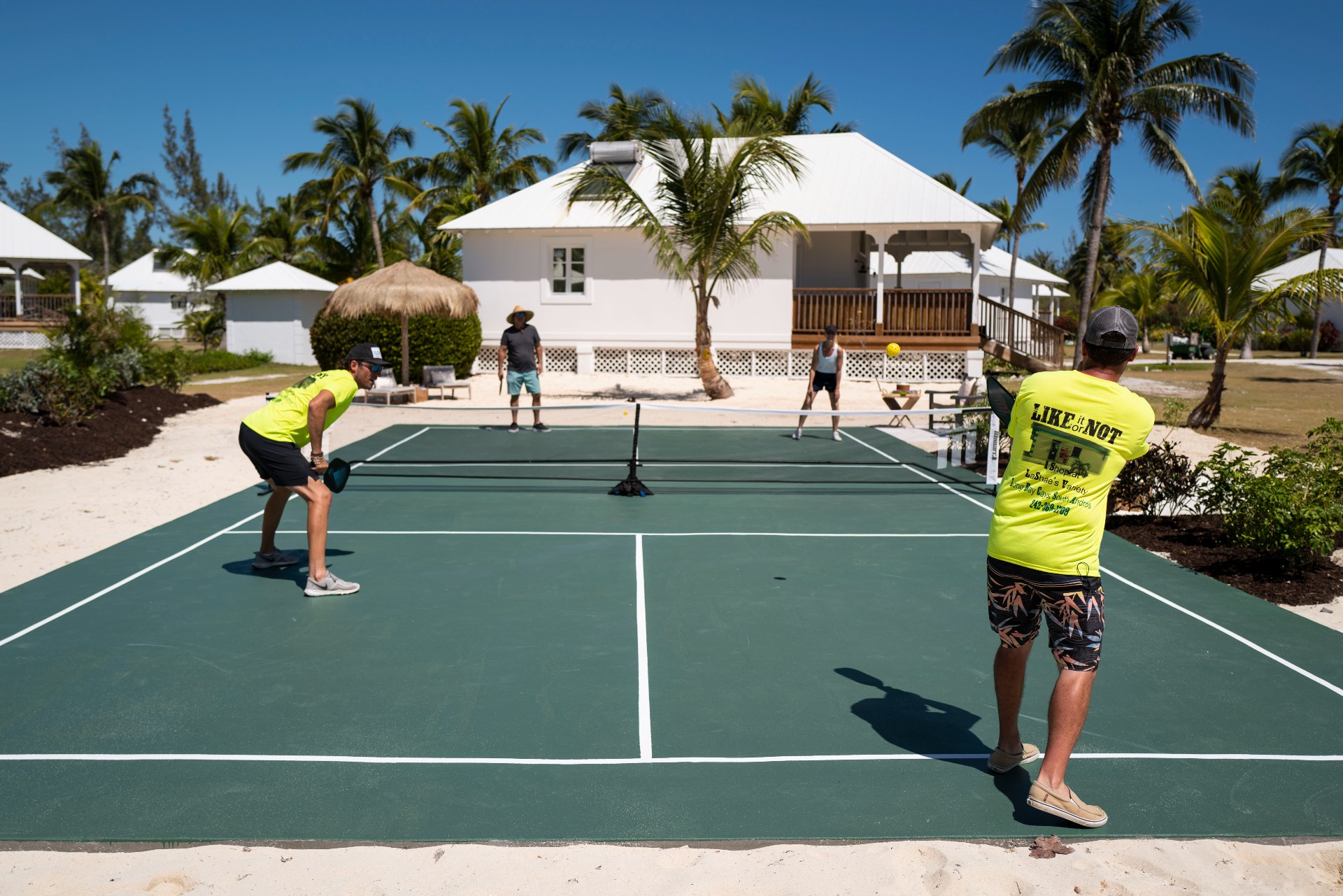 4 players on sport court at resort